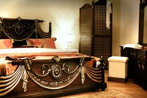 Postel nebo postele na pokoji v ubytování İsa Begov Hamam Hotel