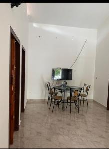 A television and/or entertainment centre at Chills homestay