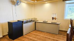 Köök või kööginurk majutusasutuses IHotels Yercaud