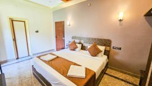 Voodi või voodid majutusasutuse IHotels Yercaud toas