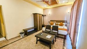 Posezení v ubytování IHotels Yercaud