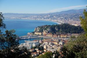a view of a city and a body of water at "Le Zen" by EnjoyNice, central spacious apartment with Airco, beach at 10 min in Nice