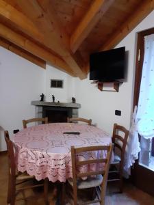TV a/nebo společenská místnost v ubytování Casa vacanze Emilio