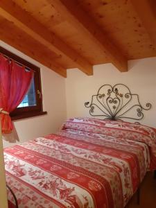 Postel nebo postele na pokoji v ubytování Casa vacanze Emilio