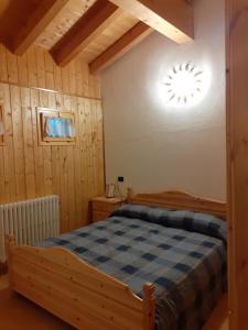 Postel nebo postele na pokoji v ubytování Casa vacanze Emilio