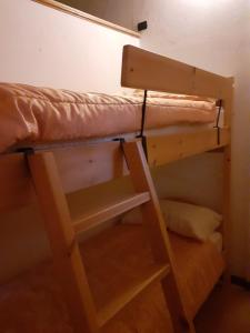 Palanda nebo palandy na pokoji v ubytování Casa vacanze Emilio