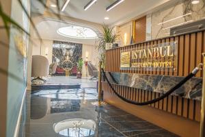 a lobby with a sign that reads island marriottatown at Istanbul Midpoint Hotel in Istanbul