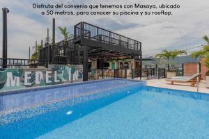 Bazén v ubytování Poblado Park Guest House nebo v jeho okolí