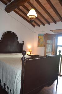Posteľ alebo postele v izbe v ubytovaní Cortona Gabolina e Turata Holiday Home