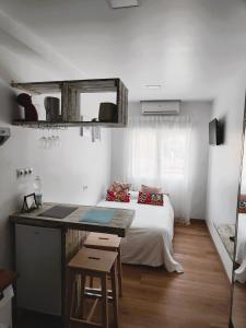 A bed or beds in a room at KHORS