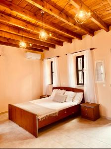 Postel nebo postele na pokoji v ubytování Pavlos House + 16 fotografií