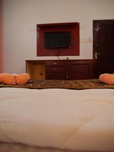 מיטה או מיטות בחדר ב-Hosteller's