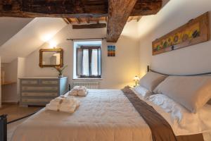 Postel nebo postele na pokoji v ubytování [L'Antico Frantoio] Natura e Relax 5* + 25 fotografií