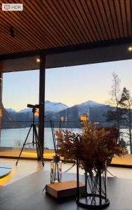 a view from a room with a camera and a tripod at VILLA KRISTINA / ÅNDALSNES in Torvik