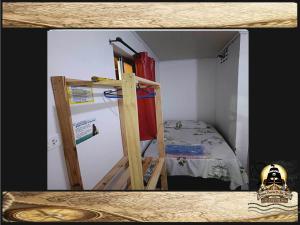 Postel nebo postele na pokoji v ubytování Pousada Piratas Di San Rocco