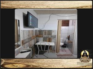 TV a/nebo společenská místnost v ubytování Pousada Piratas Di San Rocco