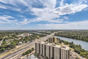 an aerial view of a city and a river at Luxury 1BR with Views, Rooftop Pool and Walk To Rainey St. in Austin