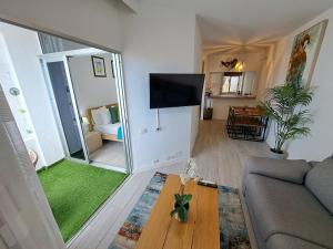 TV/Unterhaltungsangebot in der Unterkunft Ocean View Penthouse