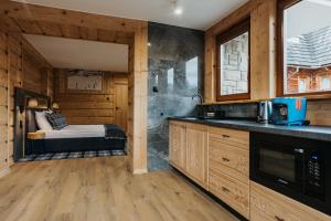 Kuchyňa alebo kuchynka v ubytovaní New Apartamenty Jan