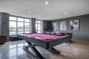 a large room with a pool table in it at Oakland Studio w Gym Pool AC near Target SFO-701 in Oakland
