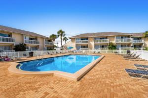 Bazén v ubytování ​Sandpiper cove nebo v jeho okolí