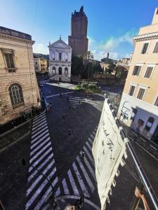 a view of a street in a city with a flag at Hotel Fiori in Rome
