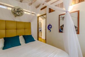 Postel nebo postele na pokoji v ubytování Casa Caracola + 37 fotografií