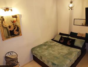 En eller flere senge i et værelse på Bella 'mbriana