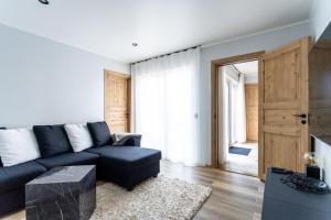 Posezení v ubytování Kuusemäe Puhkemaja + 27 fotografií