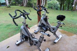 a exercise bike sitting on a table in a park at Ilha privativa - Rio Paraguaçu in Cachoeira