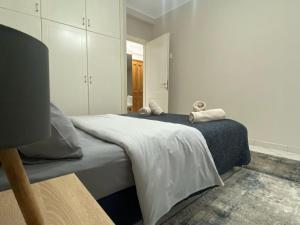 A bed or beds in a room at Guest-home 2