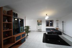 a large living room with a pool table in it at Casa Consiglia in Corbara