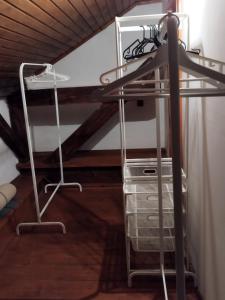 a bunk bed in a room with a ladder at Apartmán Horní Heřmanův Městec u Chrudimi in Hermanuv Mestec