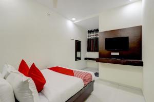 Una cama o camas en una habitación de OYO Hotel ILand Park
