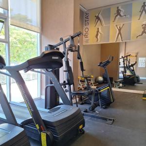 a gym with several exercise bikes in a room at Suíte no Rio Stay Apart-hotel in Rio de Janeiro