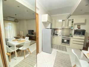 A kitchen or kitchenette at Guest-home 2