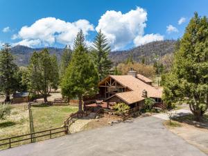 an aerial view of a house in the mountains at Gorgeous North Fork Cabin Near Bass Lake! in North Fork