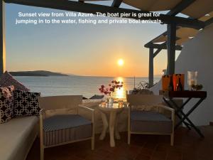 ein Blick auf den Sonnenuntergang von der Villa waeus ist der Bootsanleger ideal zum Springen in der Unterkunft VillaRentalKoufonisiGreece in Koufonisia