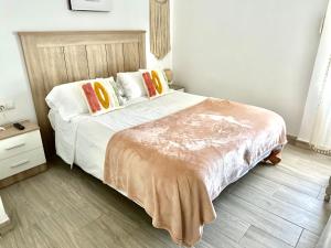 Postel nebo postele na pokoji v ubytování Iris Vistas Benalmadena