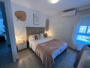 Postel nebo postele na pokoji v ubytování Iris Vistas Benalmadena
