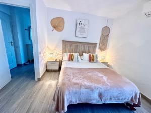 Postel nebo postele na pokoji v ubytování Iris Vistas Benalmadena