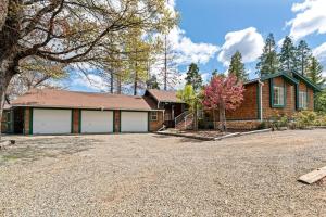 a house with a large driveway in front of it at Stunning North Fork Cabin w/ Free Wi-Fi & Smart TV in North Fork