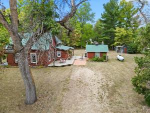 an aerial view of a house and a yard at The Paige By Tanglewood Getaways in Pepin
