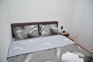 Postelja oz. postelje v sobi nastanitve ENA apartman