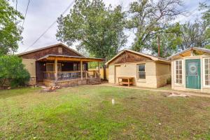 a home with a porch and a house at Centrally Located Abilene Abode 2 Mi to Downtown! in Abilene