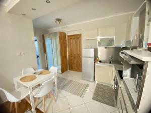 A kitchen or kitchenette at Guest-home 2