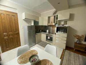 A kitchen or kitchenette at Guest-home 2