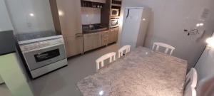 Dapur atau dapur kecil di Apto 103 apenas 5min a pé das Termas
