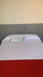 Кровать или кровати в номере HOTEL REVOLUCION