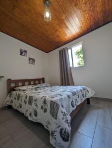 Postel nebo postele na pokoji v ubytování Ti Kaz Galet